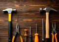several types of a tools on wooden background. A ready to use background for design Royalty Free Stock Photo