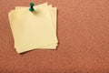 Several untidy sticky post notes pinned to cork board copy space Royalty Free Stock Photo