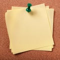 Several untidy sticky post notes pinned to cork board square Royalty Free Stock Photo