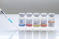 Several vials vaccine bottles of covid-19 immunization popular vaccines brands in the Royalty Free Stock Photo