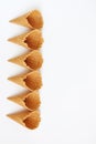 Several waffle cones lined in tower, smile, or even row, top vie Royalty Free Stock Photo