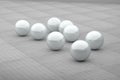 Several white futuristic balls on ceramic floor