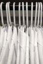 Several White Shirts on Hangers in Closet Clothing Dress Business Attire