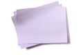 Several white sticky post it notes untidy pile front flat