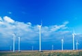 Several wind turbines.