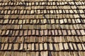 Several wood cedar shingles for siding or roofs. Brown wood roof shingles Royalty Free Stock Photo