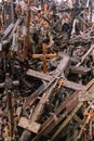 Several wooden crosses lying on the ground. Concept of faith, religion, death, sacrifice, and despair