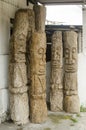 several wooden sculptures placed in front of the shop to be offered to buyers