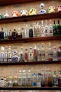 Several wooden shelves on brick background with variety of special tequilas, Cantina Restaurant, Saratoga Springs, New York, 2020