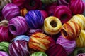 Several yarn bobbins of embroidery thread of different colors Royalty Free Stock Photo