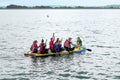 Young kids learning to paddle a raft