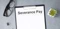 Severance Pay definition written on a paper
