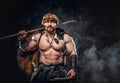 Severe barbarian in warrior clothes