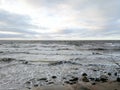 Severe december nature at the Baltic sea shore. Latvian climate in winter. Rocky seaside.