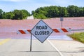 Severe Flooding in Oklahoma with road closed sign