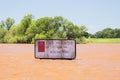 Severe Flooding in Oklahoma with tall sign under water