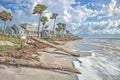A severe storm has ravaged a beach house, leaving its structure compromised and debris scattered everywhere Royalty Free Stock Photo