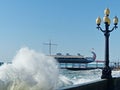A severe storm on the Yalta embankment. The ship `Argo` on the waterfront. It is stylized as Greek ships Royalty Free Stock Photo