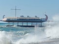 A severe storm on the Yalta embankment. The ship `Argo` on the waterfront. It is stylized as Greek ships Royalty Free Stock Photo