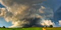 Severe supercell storm clouds with wall cloud and intense rain Royalty Free Stock Photo