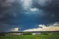 Severe supercell storm clouds with wall cloud and intense rain Royalty Free Stock Photo