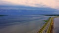 A severe thunderstorm approaches the lake.