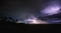 Severe thunderstorm and rain with many lightning peals and dense clouds Royalty Free Stock Photo