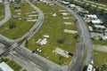 Severely damaged and overturned recreational vehicle camper vans and houses after hurricane in Florida mobile home