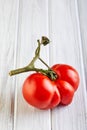 Severely malformed mutant tomato. Ugly fruit. Food shops mostly prefer the best quality fruit and vegetables, or slightly lower- Royalty Free Stock Photo