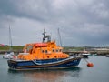 The Severn Class RNLB Roger and Joy Freeman relief lifeboat moored in Portrush Harbour, Northern Ireland, UK