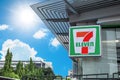 7-11 or severn eleven 24 hours convenience store front logo sign banner