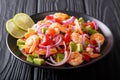 Seviche from marinated shrimp with avocado, pepper, tomatoes and