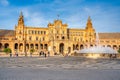 Sevilla, Spain - April 10, 2023: Tourists enjoy outdoor time in Plaza de Espana at sunset Royalty Free Stock Photo