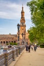 Sevilla, Spain - April 10, 2023: Tourists enjoy outdoor time in Plaza de Espana at sunset Royalty Free Stock Photo