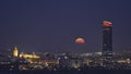 Seville with the full moon, Giralda and the Pelli Tower of witnesses Royalty Free Stock Photo