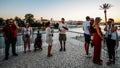 Seville Past View tour tourists using Augmented Reality technology to view Seville's emblematic sites and learn their history in