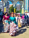 Elegant women in traditional and colorful dress at the April Fair, Seville Fair Feria de Sevilla