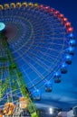 Seville, Spain - April 23, 2015: Ferris wheel illuminated at night in april fair of Seville Royalty Free Stock Photo