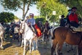 Group of riders on horseback enjoy April Fair, Seville Fair Feria de Sevilla. Royalty Free Stock Photo