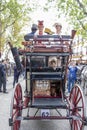 Seville, Spain - April 15, 2018: Rear view of Horse drawn carriage in Seville April Fair Feria de Abril de Sevilla with Women Royalty Free Stock Photo