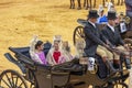 Seville, Spain - April  15, 2018: Women carries the traditional spanish head coverage called mantilla in a Horse drawn carriage in Royalty Free Stock Photo
