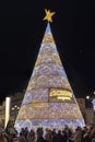 Seville, Spain - December 15, 2018: Christmas tree near Seville Cathedral of Saint Mary of the See Seville Cathedral with a lot Royalty Free Stock Photo