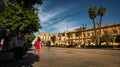 Seville, Spain - February 18th, 2020 - the Constitution Avenue near the Seville Cathedral and General Archive of the Indies in