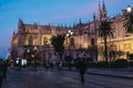 Street view of illuminated Cathedral in Seville, Spain, at night, selective focus Royalty Free Stock Photo