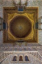 Royal Alcazar of Seville. Hall of Ambassadors ceiling detail. combed muquarnas forming a star. UNESCO world heritage site