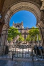 Seville Cathedral, Puerta del perdon gate and orange trees at Patio de los naranjos garden. UNESCO world heritage site