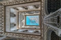 Wide angle view of Patio de las Munecas - Dolls Courtyard at Royal Alcazars of Seville. UNESCO world heritage site