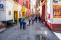 Seville Spain,May 08 2019 narrow shopping street in the historic center of Seville in Andalusia