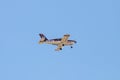 Seville, Spain - May 17, 2021: View of plane Socata TB-9 Tampico in flight, based in Aerotablada aviation school