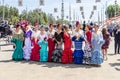 Seville, Spain - May 5, 2019: Young and beautiful women during the the April Fair of Seville on May, 5, 2019 in Seville, Spain